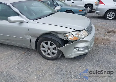 2001 Toyota Avalon Xls z USA, uszkodzony, nr VIN 4T1BF28B01U175072